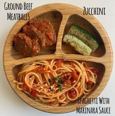 a wooden plate topped with different types of food