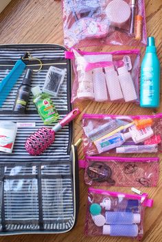 the contents of a travel bag are neatly organized