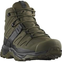 the men's hiking boots are green and black