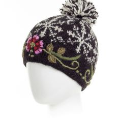 Completely one of a kind, just like her wearer, the Eleanor Beanie combines duotone Nordic jacquard knitting with rustic folk embroidery. The oversized snowflake pattern and curves of the floral pattern are a match made in heaven. Lined around the band for warmth. Make it a pair with complementary mittens. 100% wool Fleece-lined band Handmade in Nepal Fair Trade Federation Member Dry clean/hand-wash only Unique Beanies, Jacquard Knitting, Lost Horizon, A Match Made In Heaven, Folk Embroidery, Knit Hats, Match Made In Heaven, Boho Fall, Wool Beanie