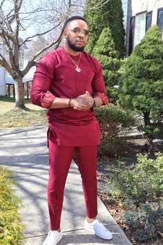 If you love to standout in the midst of other men then this outfit is for you! This is a unique classy African inspired outfit. Meticulously tailored with high quality Intalian fabrics. It comes with a top and a matching pant. Tailored to fit nicely (not too tight and not too loose). Available in Burgundy African Wear Men, Formal Long Sleeve Pant Set For Eid, Semi-formal Unstitched Suit For Festivals, Semi-formal Long Sleeve Unstitched Suit For Festivals, Elegant Long Sleeve Kurta With Traditional Patterns, Formal Long Sleeve Sets With Traditional Patterns, Fitted Long Sleeve Thobe For Traditional Ceremonies, Elegant Long Sleeve Sets With Traditional Patterns, Red Long Sleeve Semi-formal Set