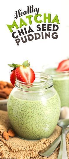 two mason jars filled with matcha pudding and topped with strawberries, almonds, and green tea