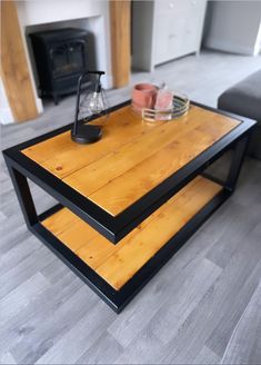 a coffee table that has some items on it