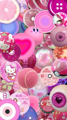 a bunch of different colored buttons with hello kitty faces on them, all in pink and purple