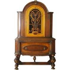 an old fashioned wooden grandfather clock