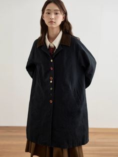 This trench coat features vertical dividing lines on the front body, visually enhancing the figure and elongating proportions. The small square collar doesn't overwhelm shorter individuals, making it suitable for all heights. The collar and main body contrast with a washed corduroy fabric, adding depth and detail. Fabric composition: Main fabric: 100% Cotton Trim: 90% Cotton, 10% Polyester Lining: 100% Polyester Model's measurements: 168cm/49kg, 83cm/72cm/90cm, wearing size L 164cm/43kg, 70cm/59 Corduroy Fabric, Oversized Coat, Charcoal Black, Black Khakis, Charcoal Color, Black Charcoal, Outerwear Women, Trench Coat, Vintage Inspired