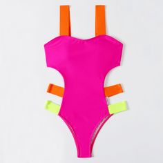 This bold, color blocks look especially fresh on this monokini swimsuit. This eye-catching one piece swimsuit features a sweetheart neckline supported by suspender straps on the shoulders, removable soft padding cups for comfort, a stretchy banded back, and the sexy cheeky bikini bottom has banded straps in neon color has cut-out effect. Size (in)BustWaistHipS29-3127-2831-33M31-3328-3033-36L32-3530-3136-38 Monokini Swimsuit, Monokini Swimsuits, Neon Color, Bold Color, Monokini, Sweetheart Neckline, One Piece Swimsuit, Color Block, Cut Out