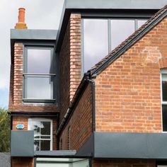 an image of a brick building with windows