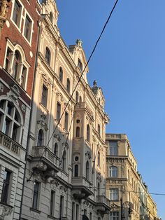 an old building with many windows and balconies