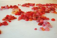 red and pink pebbles scattered on the floor