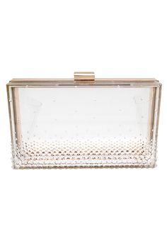 Get inspired by the elegant classic styles of yesteryear with this gorgeous GWEN Crystal Clutch. The elegant clutch bag has vintage appeal with its classic, rectangular shape and mostly transparent body that adds to its unique nature. Along the bottom border of the clutch are clear unfoiled crystals in heavy concentration layered in three rows. Just above the bottom layer are smaller radiant crystals that get smaller and smaller as they travel toward the center of the clutch where they are then Elegant Clutch, Clear Clutch, Crystal Clutch, Unique Nature, Bridal Belt, Luxury Accessories, Metal Construction, Gold Tone Metal, Clear Crystal