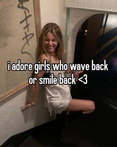 a woman leaning against a wall with the caption i adore girls who wave back or smile back