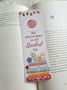 an open bookmark with the words, my christmas is all boxed up