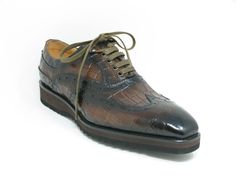 Style: 515-05-Brown Stylish and Comfortable Burnished Calfskin lace-up Oxford from the Carrucci collection features a Monkstrap Design, Decorative Perforations, soft Calfskin lining, and a full Rubber Sole for your increased comfort! Cordovan Shoes, Brown Oxfords, Leather Socks, Black 13, Shoe Tree, Suede Shoes, New Shoes, Embossed Leather, Real Leather