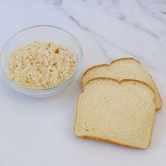 two slices of bread next to a bowl of oatmeal