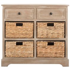 four wicker baskets sit on top of an old dresser with black handles and drawers