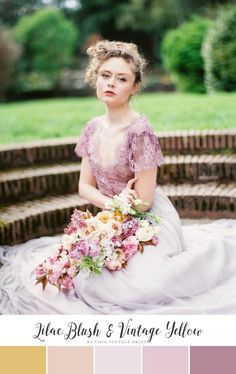 a woman in a wedding dress sitting on steps holding a bouquet of pink and white flowers