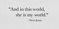 there is a quote on the wall that says and in this world, she is my world