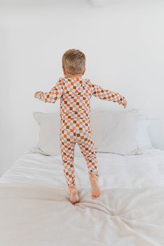 Designed with comfort and style in mind, this loungewear features classic checkered patterns in warm, fall-inspired colors like deep oranges, earthy browns, and soft creams. Perfect for lazy afternoons, sleepovers, or simply lounging around at home, this set ensures your kids stay snug and stylish all season long. 95% Bamboo Rayon / 5% spandex Care: Machine wash cold. Hang dry. Iron on medium. Do not use bleach Girls Loungewear, Loungewear Set, Checkered Pattern, Autumn Inspiration, Baby Sets, Girl Gifts, Pumpkin Spice, Boy Or Girl, Two Piece