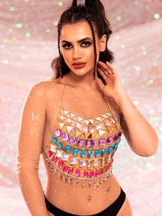 Features Of Halter Rhinestone Top 💖MULTI COLOR Rhinestone Decoration: the halter rhinestone top features multiple shapes and colors of rhinestones as the main decorative elements, and each color of rhinestones is carefully strung through a metal ring into each row of the metal chain top.💖METAL CHAIN FRAME DESIGN: This rhinestone top is framed with metal chains to enhance the overall structure and durability. The use of metal chains not only provides the necessary support for the top, but also Short Sequin Skirt, Purple Sequin Dress, Green Sequin Dress, Rhinestone Skirt, White Sequin Dress, Red Sequin Dress, Pink Sequin Dress, Silver Sequin Dress, Sequin Bodysuit