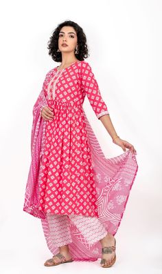 This cotton Anarkali suit has 3/4th sleeves and a combination of prints. It comes with a printed Dupatta and straight-printed pants. Offered in four different sizes from M to XL About Pironah Discover Pironah, your go-to for Indo-Ethnic and Fusion Wear on Etsy! 🌟 From Silk Suits to Anarkalis, trendy Co-ord Sets, and many more, our curated collection blends tradition and contemporary style. Shop exclusively at https://www.pironah.com for FREE 30-day exchanges and easy returns. Elevate your wardrobe with Pironah's unique fusion of elegance and trendsetting fashion! Website Visit us at www.pironah.com and explore hundreds of eye-catching designs and collections to dresses to suit every occasion. Anarkali Set With Printed Border And Straight Kurta, Anarkali Palazzo Set With Printed Border For Navratri, Anarkali Palazzo Set For Navratri With Printed Border, Pink Anarkali Block Print Palazzo Set, Ankle-length Block Print Kurta For Diwali, Navratri Anarkali Set With Printed Border, Straight Kurta, Ankle-length Block Print Kurta For Navratri, Navratri Anarkali Palazzo Set With Printed Border, Diwali Ankle-length Palazzo Set With Printed Motifs