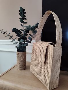 Plastic canvas is used to make bags. In this way, the bag has a neat appearance. Natural raffia rope is used. The dimensions of the bag are 26x28 cm It is suitable for daily use. Natural Square Shoulder Bag With Adjustable Strap, Beige Handwoven Square Shoulder Bag, Handwoven Beige Shoulder Bag With Double Handle, Handwoven Beige Double Handle Shoulder Bag, Beige Handwoven Satchel For Everyday Use, Beige Handwoven Double Handle Shoulder Bag, Natural Color Square Shoulder Bag For Everyday Use, Rectangular Woven Shoulder Bag For Daily Use, Handwoven Square Shoulder Bag For Everyday Use