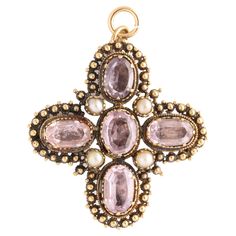 A beautifully granulated pale amethyst and 18 kt gold pendant or brooch that is set with four natural pearls around the center stone. The gems are closed in the back and foiled. The gold does not overpower the amethysts and the granulation gives the jewel delightful texture. Though dainty it is not too delicate for a gent to wear on his jacket. Surrounding the prongs on all amethysts is tiny granulation. Georgian jewelers did not spare the handwork. A beautiful pendant or brooch from c. 1820 and Georgian Jewelry, Antique Brooches, Drop Necklace, Antique Jewellery, Natural Pearls, Gold Pendant, Antique Jewelry, Gentleman, Amethyst