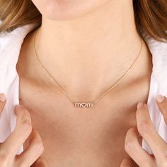 "Diamond 14K Gold Mom Necklace, Mama Heart Necklace Gold And Cz, Dainty Mothers Necklace, Mom Gift - Mom Jewelry - Mothers Day Gifts, Initial Mama Necklace Gold, Personalized Mothers Necklace D E T A I L S * 100% 14K(585) Real Gold (no gold-filled or no gold plated material) * Mom Height: 5.50 mm * Mom Width: 18.50 mm * Diamond Carat: 0,20-0,23 * Diamond Color And Clarity: G-H / VS-SI * It will come with premium gift wrapped and gift box Mothers Day Gift - Mom Gift, Mama Necklace, Mother Necklac Gold Heart Necklace, Gift For Mom, 14k Gold Heart Necklace, Perfect Gift For Mom, Dainty Gold-plated Name Necklace For Mother's Day, Elegant Heart-shaped Name Necklace For Mother's Day, Mother's Day 14k Gold-filled Gold Necklaces, Necklace Mama, Heart Necklace Gold, Lightning Bolt Necklace, Mother Necklace Personalized