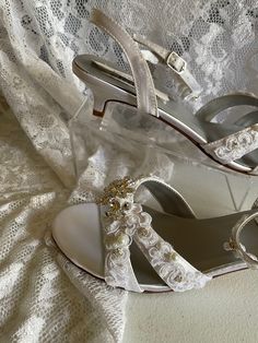 "THIS LISTING IS FOR ONE PAIR SIZE: 9.5 AA Narrow WHITE, STYLE AS SHOWN ON FIRST PICTURE Amazing laze and Crystals Shoes. This shoe is the cutest lowest heel wedding shoes: Heels: 1 1/4'' For super comfort! For Brides who prefer open toes! INSIDE LENGHT: 9 5/8\" INCHES, PLEASE MEASURE YOUR FEET LENGHT TO ENSURE FIT. FINAL SALE, NO RETURNS, NO EXCHANGES. THANK YOU! FOR OTHER SIZES, PLEASE FOLLOW LINK BELOW: www.etsy.com/listing/693079862/white-kitten-heel-shoe-bling-pearls-lace? Colors Available: White Pearl Open Toe Heels, Open Toe Kitten Heels For Wedding, Summer Wedding Low Heel Kitten Heels, White Pearl Open Toe Wedding Shoes, White Open Toe Kitten Heels For Formal Occasions, Formal White Pearl Wedding Shoes, Elegant White Kitten Heels For Wedding, White Open Toe Kitten Heels For Wedding, White Pearl Wedding Shoes