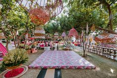 an outdoor area with tables, chairs and umbrellas