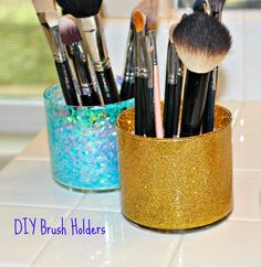 a cup filled with makeup brushes on top of a counter