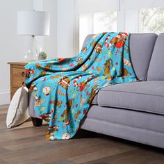 a couch with a blanket on top of it