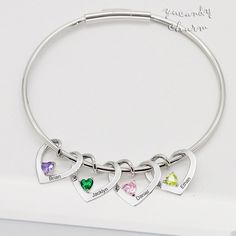 "This is the Birthstone Collection for charm bracelet which is personalized with beautiful heart charms engraved with kids / family names showing the love and connection to each of your families. This special mothers bracelet is made of stainless steel with Rose Gold/Gold/White gold plated which is durable, resilient and affordable. Birthstones are CZ crystals, very shinny. This personalized bracelet is elegant and stunning. It can adorn any outfit and any look you hope to achieve. This is handm Personalized Silver Heart Bracelet For Mother's Day, Silver Heart Bracelet With Name, Custom Name Heart Bracelet For Mother's Day, Silver Heart Name Bracelet, Personalized Heart Name Bracelet, Personalized Heart-shaped Name Bracelet, Personalized Heart Bracelet With Name, Personalized Heart Charm Bracelet, Personalized Name Heart Bracelet