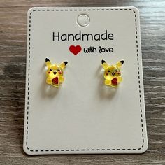 This Listing Is For A Pair Of Handmade Pikachu Earring Studs. Earring Stud Is 5mm And Made Out Of Stainless Steel. Hypoallergenic Earring Post And Earring Back. Pikachu Is Made Out Of Acrylic. Super Cute For Kids Or Adults! :) **Comes From A Smoke Free Home** Playful Hypoallergenic Yellow Earrings, Playful Yellow Hypoallergenic Earrings, Fun Yellow Jewelry For Birthday, Playful Adjustable Yellow Earrings, Fun Yellow Round Jewelry, Cute Yellow Hypoallergenic Jewelry, Cute Handmade Yellow Jewelry, Handmade Yellow Novelty Jewelry, Yellow Handmade Novelty Jewelry