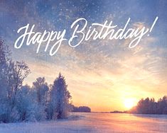 a happy birthday card with the sun setting over a lake and trees in the background