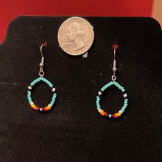 Small western teal beaded earrings, lightweight and hypoallergenic :) Handmade with seed beads and beading wire. Turquoise Beaded Teardrop Hoop Earrings, Adjustable Beaded Turquoise Teardrop Earrings, Southwestern Green Beaded Dangling Earrings, Turquoise Teardrop Earrings With Tiny Beads, Colorful Southwestern Beaded Earrings, Southwestern Turquoise Beaded Earrings, Southwestern Teardrop Turquoise Beaded Earrings, Southwestern Style Turquoise Beaded Earrings, Southwestern Turquoise Teardrop Beaded Earrings