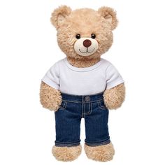 a brown teddy bear wearing overalls and a white t - shirt with his hands in his pockets