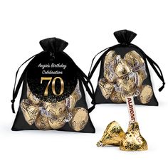 two bags filled with gold foiled chocolates