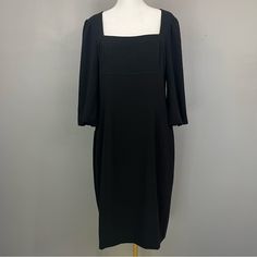 Get Ready To Turn Heads In This Stunning Black Sheath Dress From David Meister. With A Flattering Empire Waist And Square Neckline, This Knee-Length Dress Is Perfect For Any Occasion. The Puff Sleeves And Solid Pattern Add A Touch Of Elegance, While The 3/4 Sleeve Length Makes It Versatile For Any Season. Fully Lined. Size 12 Approx Measurements Taken Flat: Pit To Pit: 18” Length: 40” Empire Waist: 17” Waist: 16” Return Tag Still Attached. New Condition - No Noted Flaws. Smoke Free Home. Bodycon Square Neck Midi Dress In Solid Color, Bodycon Square Neck Midi Dress, Solid Color Square Neck Bodycon Midi Dress, Solid Square Neck Midi Dress For Night Out, Solid Midi Dress With Square Neck For Night Out, Black Square Neck Dress For Work, Black Square Neck Work Dress, Black Square Neck Midi Dress For Formal Occasions, Formal Solid Bodycon Dress With Square Neck