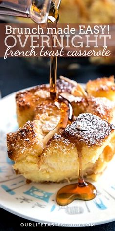 french toast casserole with syrup being drizzled over it on a plate