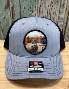 Barn Buck Deer Patch Trucker Hat  AG Outfitters Exclusive Design, art by Dustin Dattilio! Richardson 112 Five Panel brand hat Outdoor Trucker Hat With Graphic Print And Curved Brim, Outdoor Graphic Print Trucker Hat With Curved Brim, Casual Hats With Graphic Print And Flat Brim, Adjustable Flat Bill Hat With Graphic Print, Casual Hat With Graphic Print And Flat Brim, Outdoor Graphic Print Adjustable Baseball Cap, Casual Flat Brim Hat With Graphic Print, Adjustable Graphic Print Hat With Curved Bill, Adjustable Outdoor Hat With Graphic Print