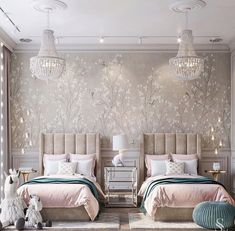 two beds in a room with lights on the ceiling and lamps hanging from the ceiling