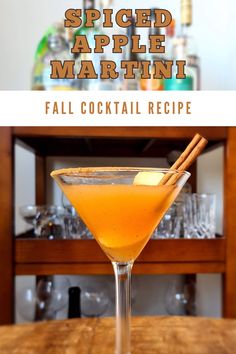 an orange cocktail in a martini glass with cinnamon stick garnish