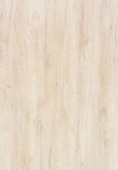 a close up view of the wood grains on this flooring material, which is light brown in color