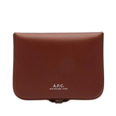 Protect your essentials with ease in the sophisticated yet understated A.P.C. Josh Wallet. Crafted from premium vegetable tanned calfskin leather that will become uniquely yours with every year of use, this box-like wallet safely secures your loose change in addition to offering ample storage for five cards. Enjoy the warmth and natural texture this handsome chestnut-colored material will take on over time. With press stud closure and minimalist silhouette, the A.P.C. Josh Wallet is a timeless accessory that will complement any outfit while maintaining essential organization on-the-go. Classic Rectangular Coin Purse, Classic Wallets With Removable Pouch, Classic Compact Wallet With Removable Pouch, Classic Rectangular Coin Purse With Magnetic Closure, Classic Wallet With Removable Pouch, Chestnut Color, Timeless Accessories, Vegetable Tanned Leather, Natural Texture