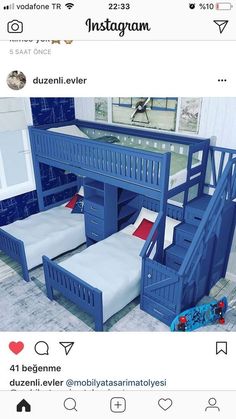 the bunk bed is blue and has two sets of stairs on each side, which are also attached to other pieces of furniture