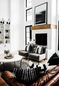 a living room filled with furniture and a fire place