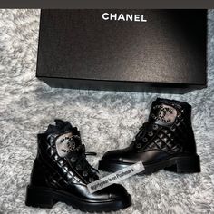 Chanel Combat Boots Quilted Lace Up Interlocking Cc Logo Condition: New In Box With Dust Bag Size: Women’s Us 7/ Eu 37 Color: Black With Gold Tone Hardware Material: Calfskin & Metal Authentic, Please Feel Free To Look At All My Reviews Given By Other Buyers. Rest Assured That If You Purchase This, Poshmark Authenticates Anything Over $500. It Will Get Sent Out To Poshmark Headquarters To Get Authenticated, And Once They Authenticate It, The Authenticators Will Ship It Out Directly To You. Pleas Luxury Lace-up Patent Leather Boots, Luxury Round Toe Boots With Branded Insole, Luxury Patent Leather Boots, Luxury Boots With Round Toe, Luxury Black Boots With Reinforced Heel, Designer Formal Boots With Lug Sole, Luxury High-top Boots With Branded Heel Counter, Luxury Black Patent Leather Boots, Luxury Black Boots With Leather Sole