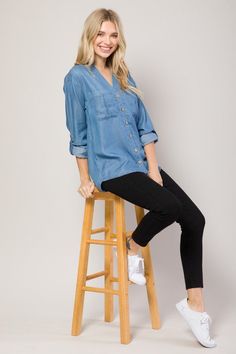 Description This Chambray Shirt is classic in design and features a split v-neck and roll up sleeves. The back is a tad longer and provides perfect coverage with leggings. It has soft, buttery fabric making it perfect for layering in every season. A must-have to level up your layering game. Also ideal for wearing as is. Tuck it in for the perfect work look or wear it casually with dark pair of denim. All About the Fit Fabric Feel (light) 1 2 3 4 (heavy) Fit (slimfit) 1 2 3 4 (loosefit) Fabric De Casual Fitted Blouse With Roll-up Sleeves, Versatile Fall Blouse With Roll-up Sleeves, Casual Blouse With Roll-up Sleeves And Shirttail Hem, Casual Tops With Roll-up Sleeves And Shirttail Hem, Solid Shirt With Shirttail Hem For Fall, Everyday Tops With Roll-up Sleeves, Casual Fitted Shirt With Shirttail Hem, Versatile Everyday Shirt For Fall, Versatile Everyday Fall Shirt