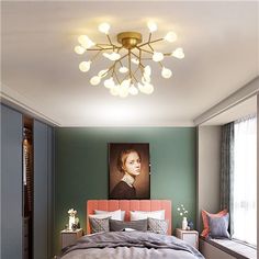 a bed room with a neatly made bed and a painting on the wall above it